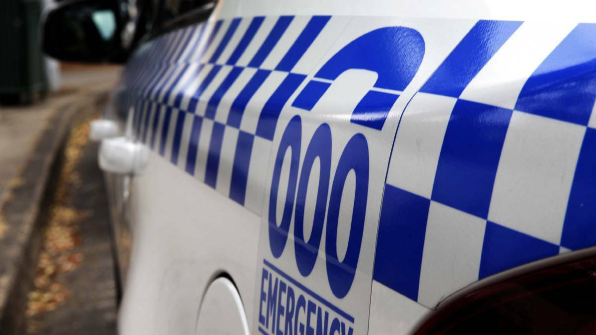Man killed after collision between ute and truck