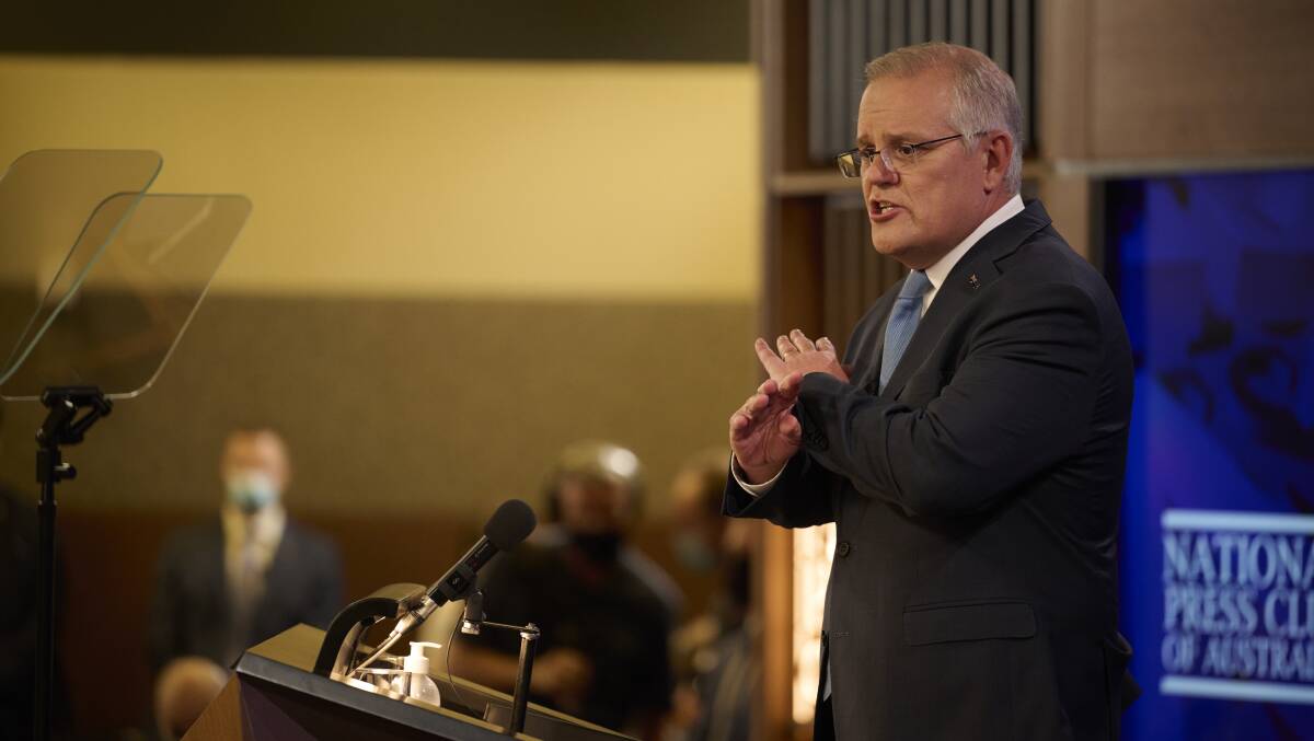 Prime Minister Scott Morrison speaks about his management of the pandemic at the National Press Club on Tuesday. Picture: Getty Images
