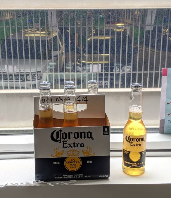 A group of tradies organised a delivery of beer - Corona, of course - to Tony O'Neill's hotel room. Photo: Supplied.