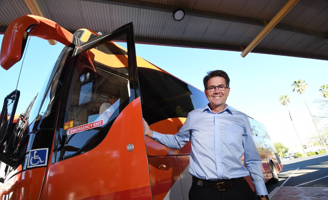 ALL ABOARD: MP Kevin Anderson with one of the NSW TrainLink buses heading west on Monday. 