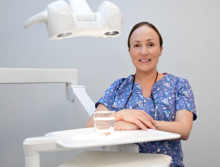 PROMOTING HEALTH: Dubbo Dental Surgery dentist Sophie Halpin warns residents of the risk of sugary drinks. Photo: AMY McINTYRE. 