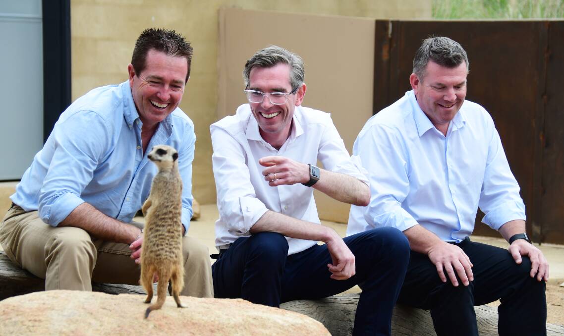 FUN TIMES: NSW Deputy premier Paul Toole, Premier Dominic Perrottet and Member for Dubbo Dugald Saunders make a new friend. Picture: AMY MCINTYRE