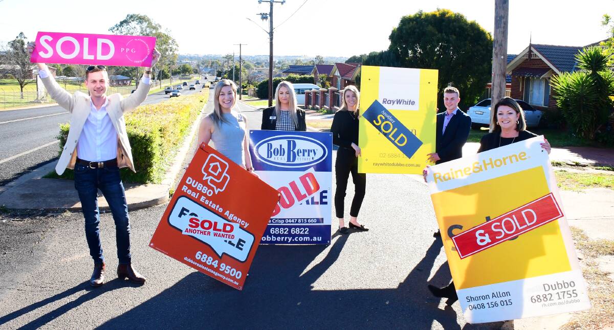 ...AND SOLD: Dubbo Agents Lachlan Cusack, Tara Searle, Elle Crisp, Samantha Sims, Ben Tierney and Sharon Allen. Photo: AMY MCINTYRE