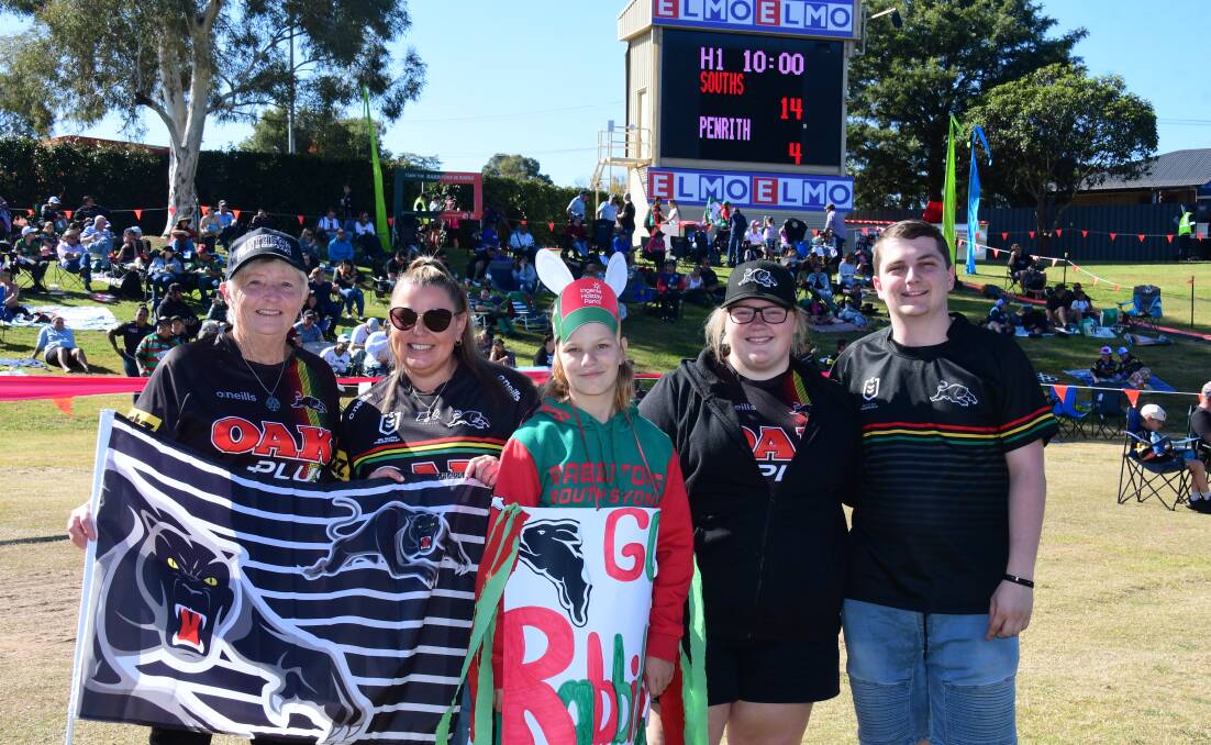 FOOTY FANS: Michelle O'Neill, Christie and Zayla Facey, Maddy Buckley and Matt Whale. Photo: AMY MCINTYRE