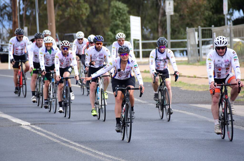 Tremendous: 2019 Toyota Tour de OROC ride captain Nina Dowling shows the way to the finish line at Dubbo. Photo: AMY MCINTYRE