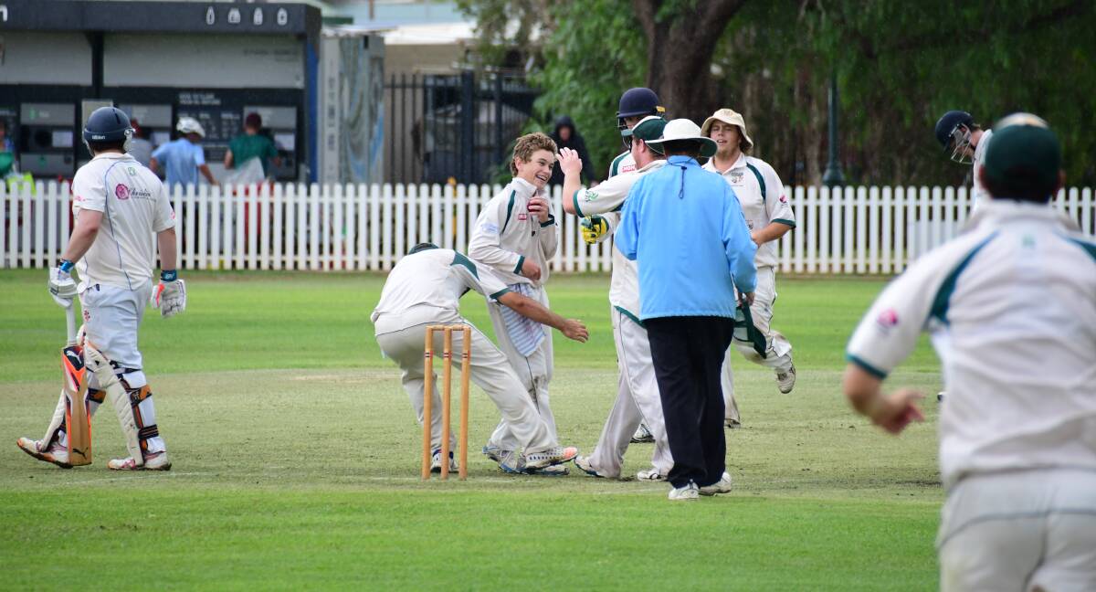 VICTORY: CYMS Celebrate a wicket from young gun Paddy Nelson on Sunday. PHOTO: AMY MCINTYRE.