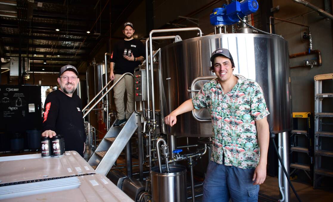 Brew crew: Devil's Hollow Brewery general manager Brendon O'Sullivan with Matt Devenish and Zac Hayton. Photo: AMY MCINTYRE