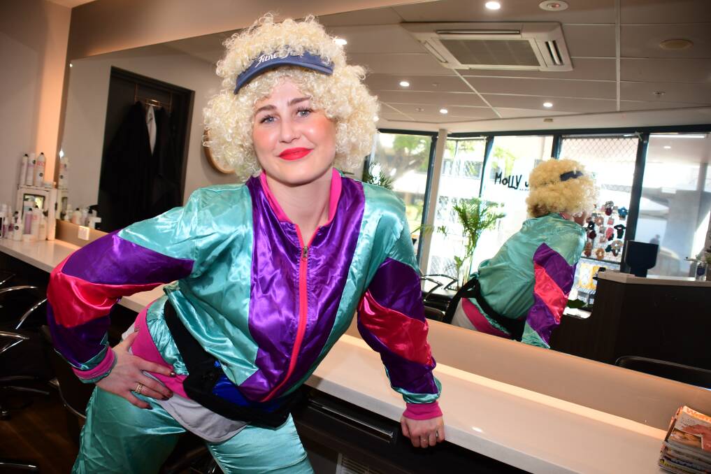 COMMUNITIES CHOICE: Superior Style Hair Dubbo RSL salon owner and hairdresser Molly Job dresses up as Kath Day Knight for Fun Fridays. Photo: AMY McINTYRE. 