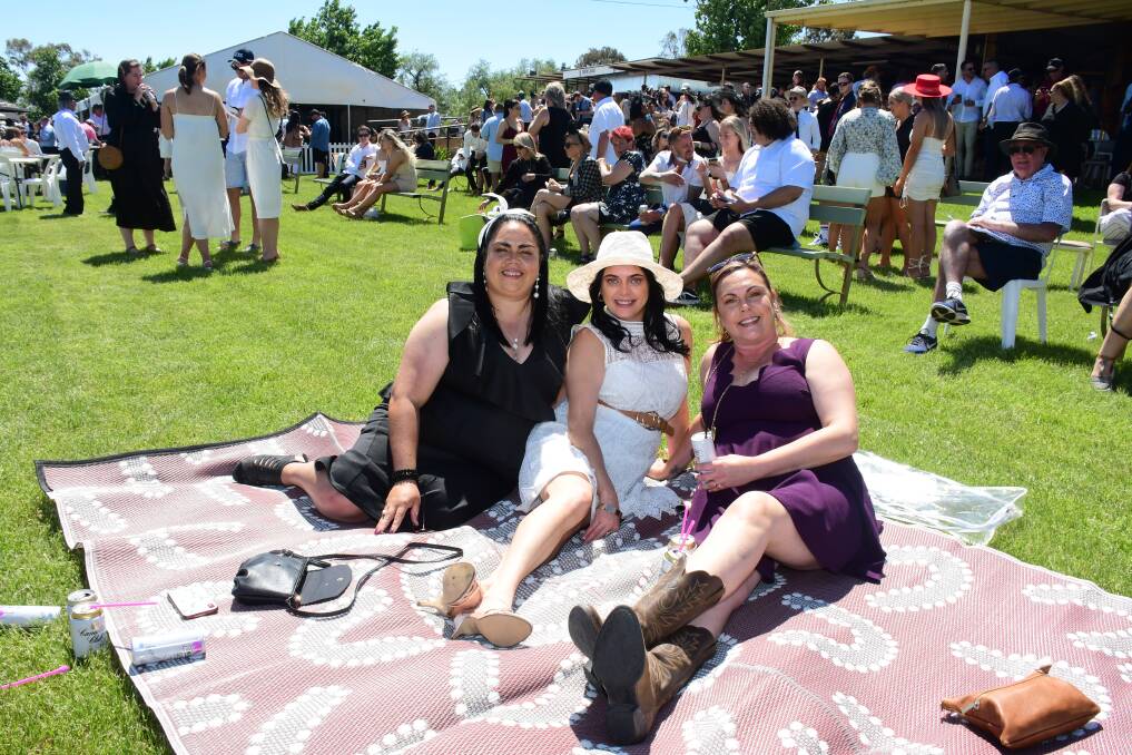 BACK ON TRACK: Racegoers Wanita Gibbs with Jade and Dawn Towney. Picture: AMY McINTYRE.
