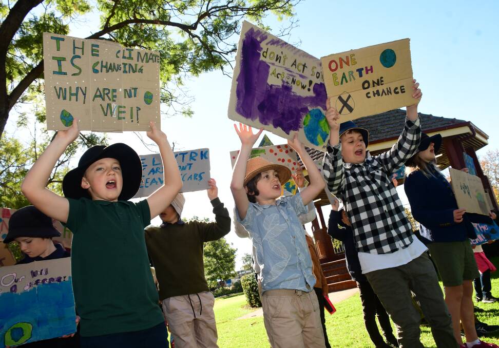 CLIMATE STRIKE: Protesters Solly Day, Max Whiting and Lucas Ward. Photo: AMY McINTYRE. 
