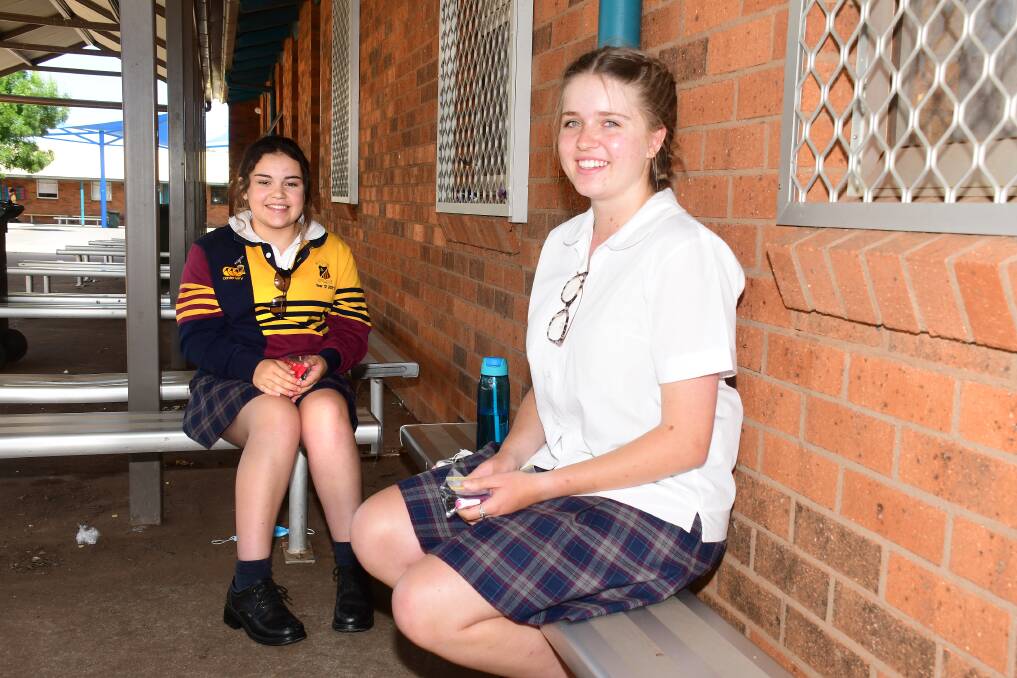 RELIEF: St John's College students Ashleigh Young and Isabella Willis relieved to commence exams. Picture: AMY McINTYRE. 
