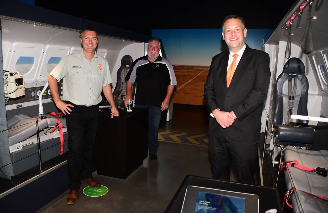 GOOD NEWS: Steve Hinks, John Larkin and Ben Shields at the RFDS Visitor Experience Centre. Photo: AMY McINTYRE. 