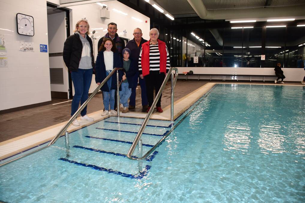 The Diffey family surveying the hydrotherapy pool. Photo: AMY McINTYRE