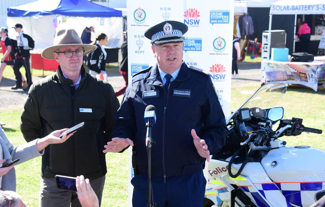 REPORT: CEO of Crime Stoppers Peter Price and NSW Police Assistant Commissioner Geoff McKechnie at the Dubbo Show. Photo: AMY McINTYRE