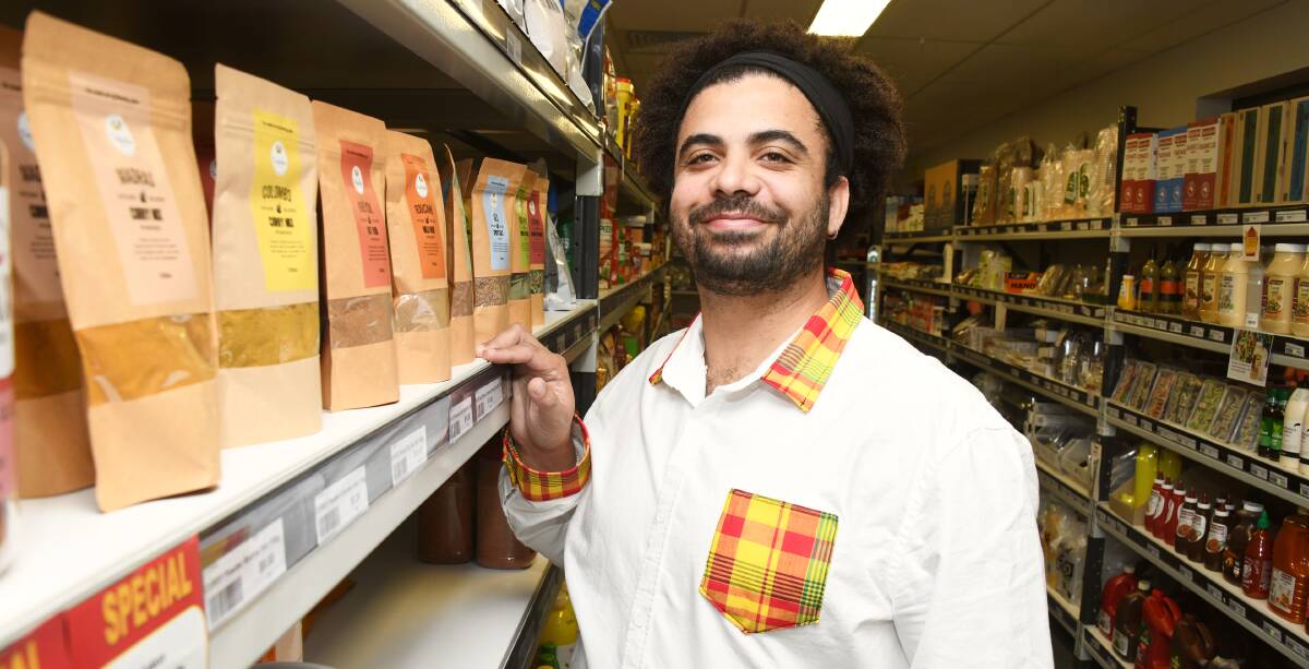 French Caribbean kick: Touloulou founder and director Micka Ozier with his range of spices, available at Dubbo's Midwest Foods Market. Picture: AMY MCINTYRE