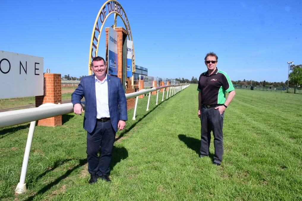 TRIUMPHANT RETURN: Dubbo MP Dugald Saunders and Dubbo Turf club GM Vince Gordon announced the return of Derby Day 2021. Photo: AMY MCINTYRE