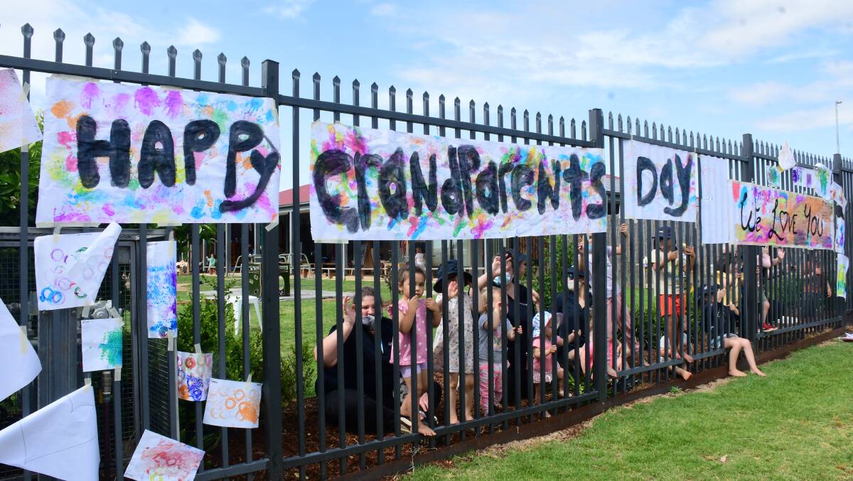 Colourful: Artworks made for Children's Week adorned the Gowrie fence. Photo: AMY MCINTYRE