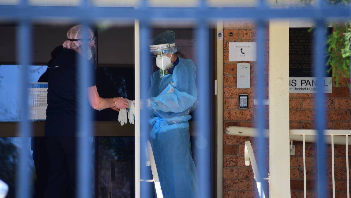 DEEP CLEAN: Workers at St Mary's Villa, Dubbo where there has been a COVID-19 outbreak. Photo: AMY MCINTYRE