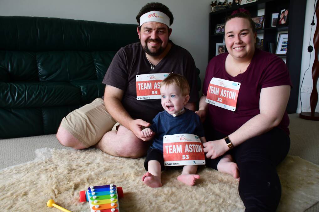 CLOSE TO OUR HEART: Adam and Rachel Heather with their son Aston will take part in the 65k for 65 Roses Walkathon this week. Photo: AMY McINTYRE