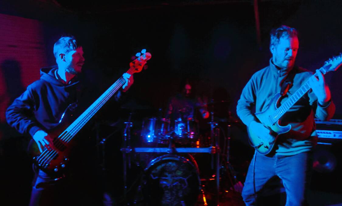 BRINGING THE HEAVY: Blue Mountains progressive metal trio Red Bee headlined an impressive three-act bill at The Farmer's Arms on Saturday night. Photo: SAM BOLT