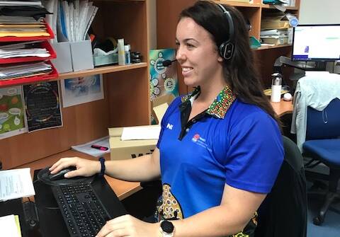 HERE TO HELP: COIVD-19 Clinical Call Centre's Sara Darney is among those answering calls for help from people in Western NSW about the coronavirus. Photo: SUPPLIED