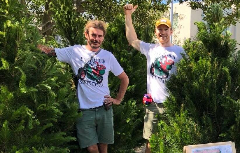FESTIVE SALES: Matt Wheeler and Rowan Friend from Aussie Christmas Trees were running the Christmas tree sales for Royal Far West this year. Picture: Supplied