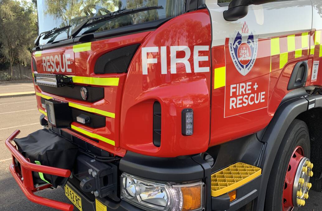 CALL OUT: Firefighters were called to an early morning fire that was burning through trees and close to netball playing fields. Photo: FILE