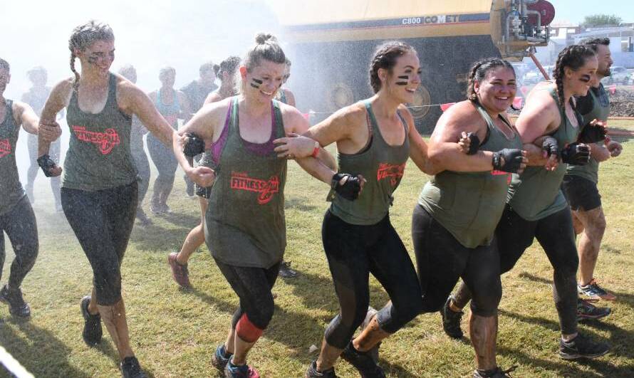 TOGETHER: See all the photos from the 2019 Titan Macquarie Mud Run. Photos: AMY MCINTYRE