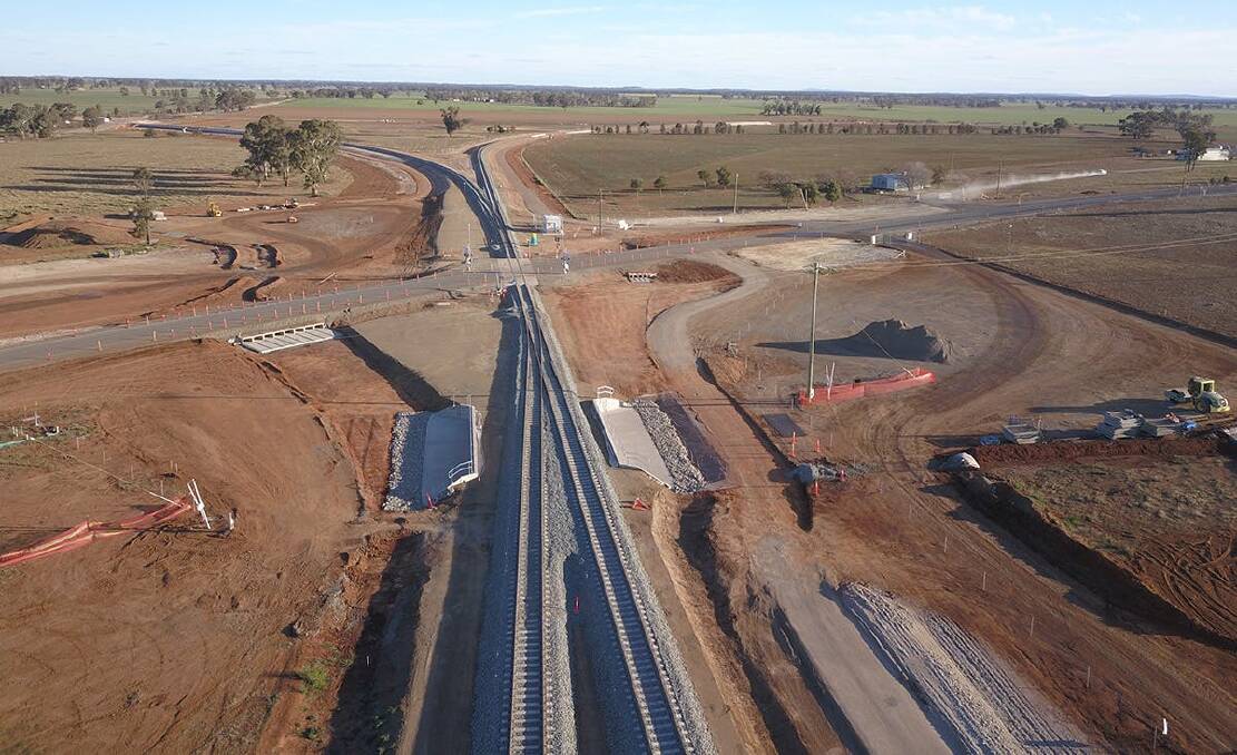 WEST PARKES: This bird's eye image was taken when the connection between the north-south and east-west rail lines of the Inland Rail project at Parkes were complete in August 2019. This triangular connection (top of the photo) is located almost in the centre of where the proposed Special Activation Precinct will be. Photo: ARTC