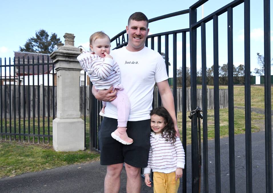 WEST IS BEST: Tom Romer, pictured with children Tilli and Charli, is gearing up for his Western Rams debut at Forbes on Sunday. Photo: JUDE KEOGH