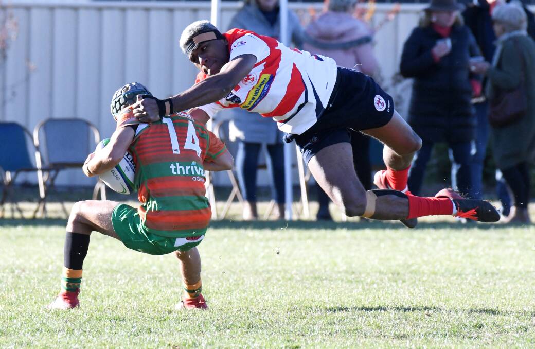 MAKING MOVES: Cowra collects another win as City's losing streak worsens. Photos: JUDE KEOGH