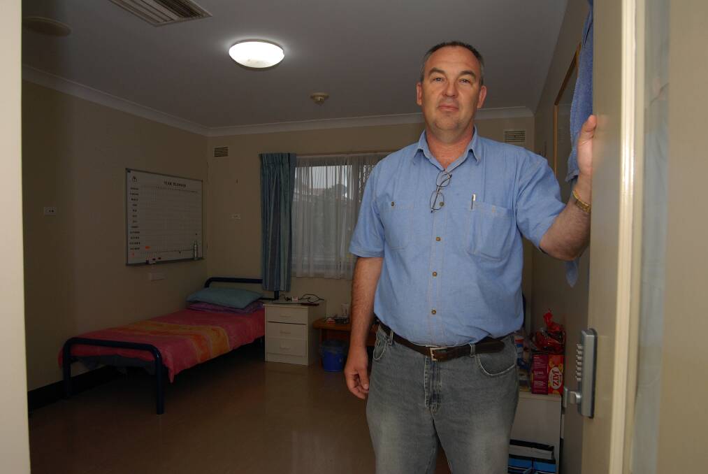 Sturt House manager Peter Gallagher in one of the bedrooms available to the homeless in Dubbo.  
												        Photo: BELINDA SOOLE