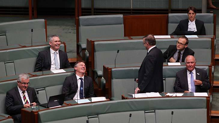 Leader of the House Anthony Albanese speaks to the crossbench MPs during the pokies reform legislation debate in the House of Representatives.