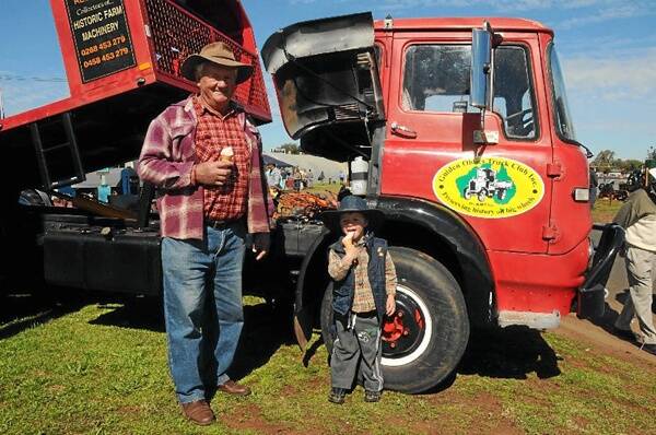 Lance McLead and Eric Peatling enjoying what this year’s Dubbo Vintage Truck and Tractor Show had to offer at the Dubbo Showground yesterday. Photo: JEN MCGHEE