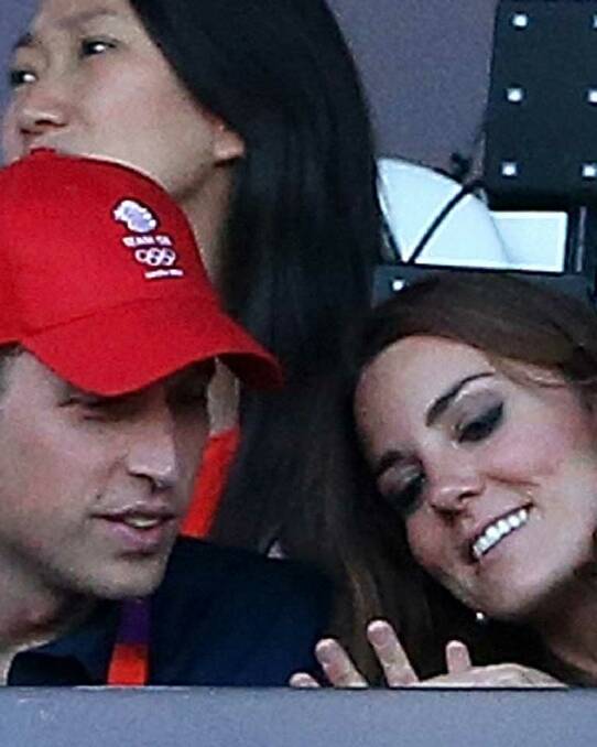 Having a moment - Kate and Will find Kate's hand most entertaining (athletics, aside of course).