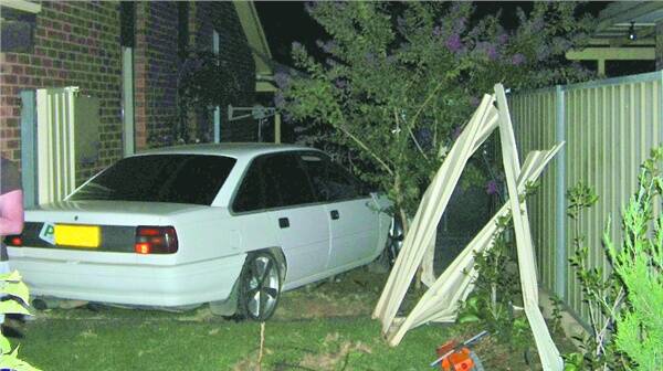 A 21-year-old male driver crashed into the fence of a Currawong Street home about 9.10pm Saturday.