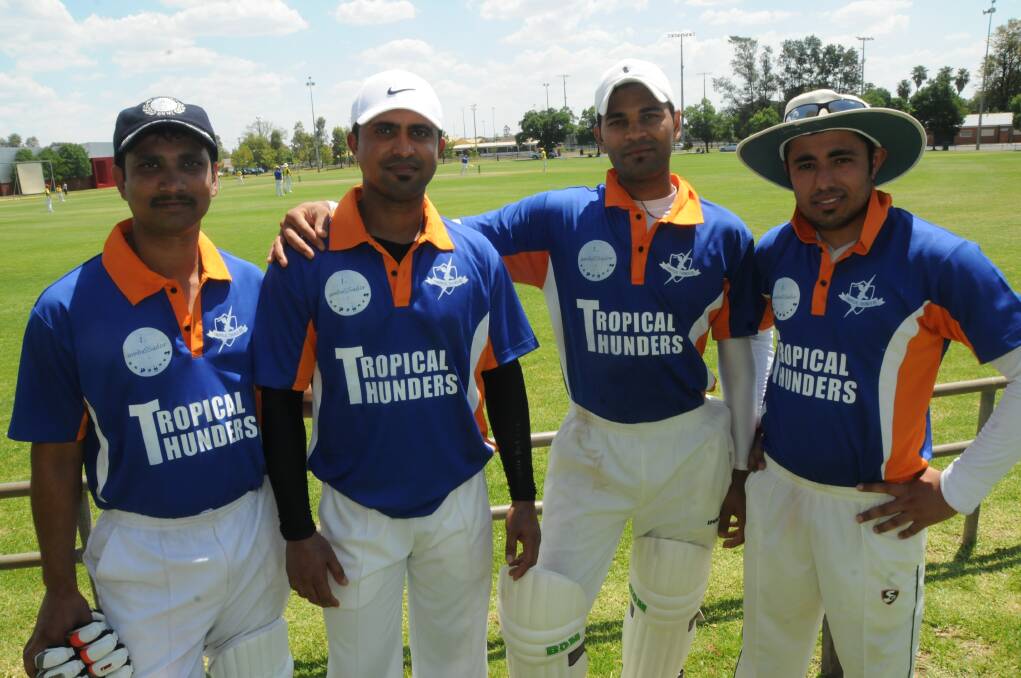 Tropical Thunders captain Yogesh Chawla (right) with teammates Vinay Kapila, Dharmendra Mepani and Jerose Joseph at No.2 Oval for the game against the Aussie Bolts. Photo: JOSH HEARD
