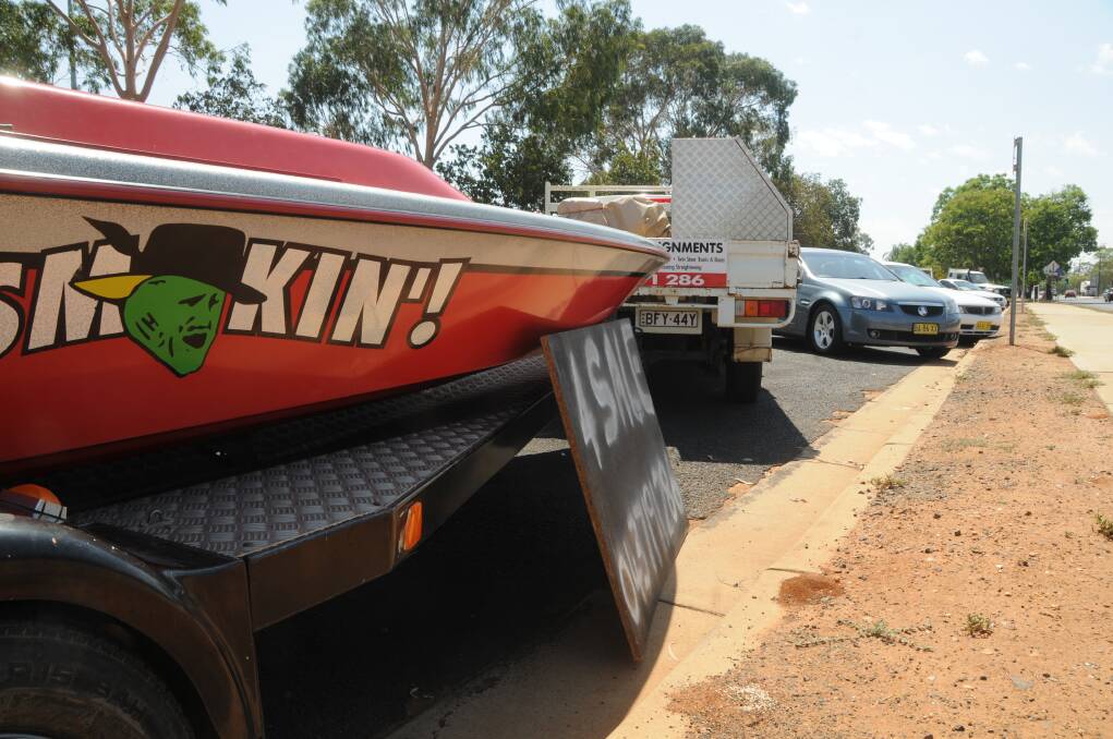 Dubbo City Council will crack down on the illegal practice of selling cars and boats on the roadside from Monday. Photo AMY MCINTYRE