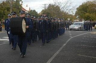 The guard of honour that paid tribute to Senior Constable Renae Landgraf. Hundreds of friends and colleagues gathered to farewell  the senior constable at St Brigid’s Catholic Church yesterday.