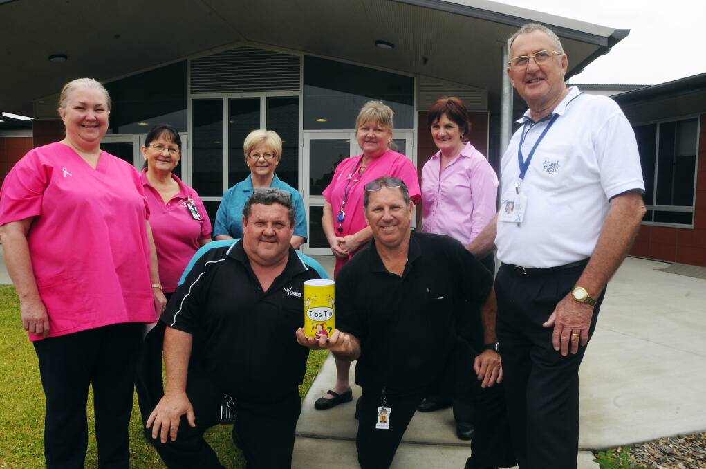 Lourdes team members Maria Josephson, Dale Smede, Sandy Langford, Robyn Monk and Wendy Scott and (front) Wayne Collins and Trevor Taylor and Angel Flight Earth Angel Barry Joseph.	Photo: BELINDA SOOLE