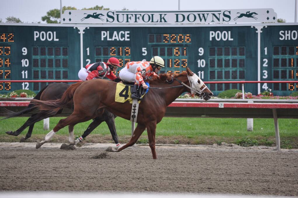 Race favourite Dr Maureen H (outside) gets the better of a rival at Suffolk Downs. 	Photos: BEN WALKER