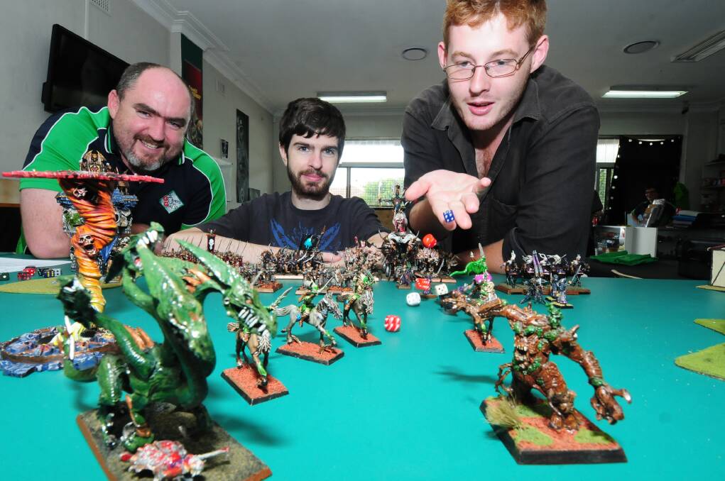Adam Wonderley, Ian Thomson and David Fizzell will take their chances at this year's Cancon games fair. 
Photo: LOUISE DONGES