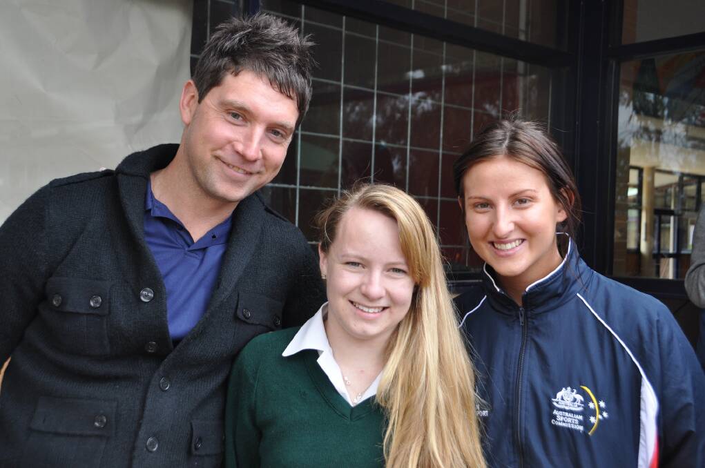 School captain Sarah Toohey was presented with the Pierre de Coubertine Sports Award yesterday. She was congratulated by sports stars Ben Austin and Megan Dunn.