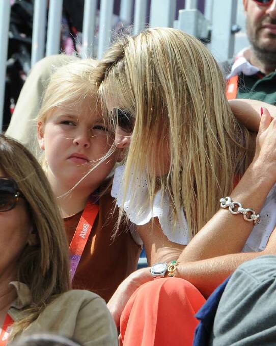 Princess Catharina-Amalia of the Netherlands (L) and Princess Maxima of the Netherlands share a moment in the sun at the equestrian events on day 7.