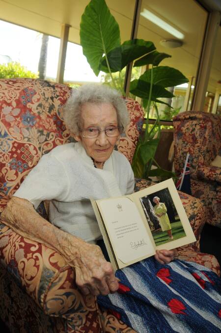 Stella Brook with her letter from Queen Elizabeth II congratulating her on her 100th birthday. 			   Photo:AMY MCINTYRE