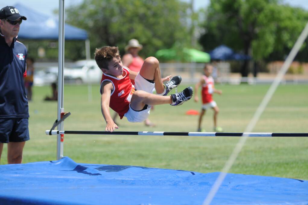 Bailey Depasquale doing his best in the high jump at the Dubbo New Year Athletics Carnival. Photo: JOSH HEARD