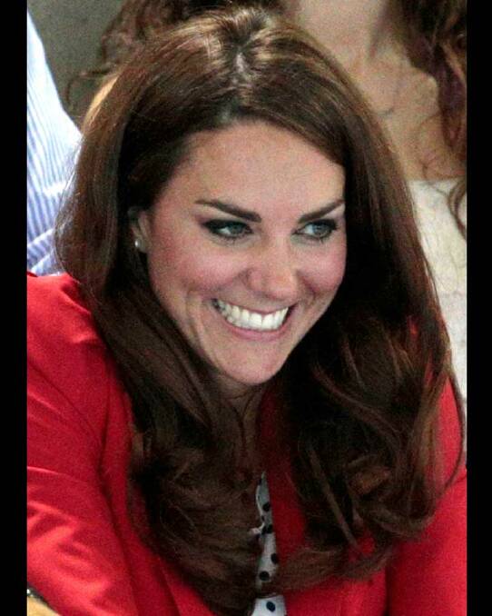 The Duchess of Cambridge grimaces, throwing herself into the moment, as she watches the swimming finals.