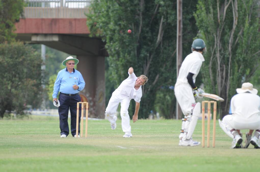Rob Childs gives the ball some air on his way to two wickets for Rugby against Colts on Saturday. 							 Photo: JOSH HEARD