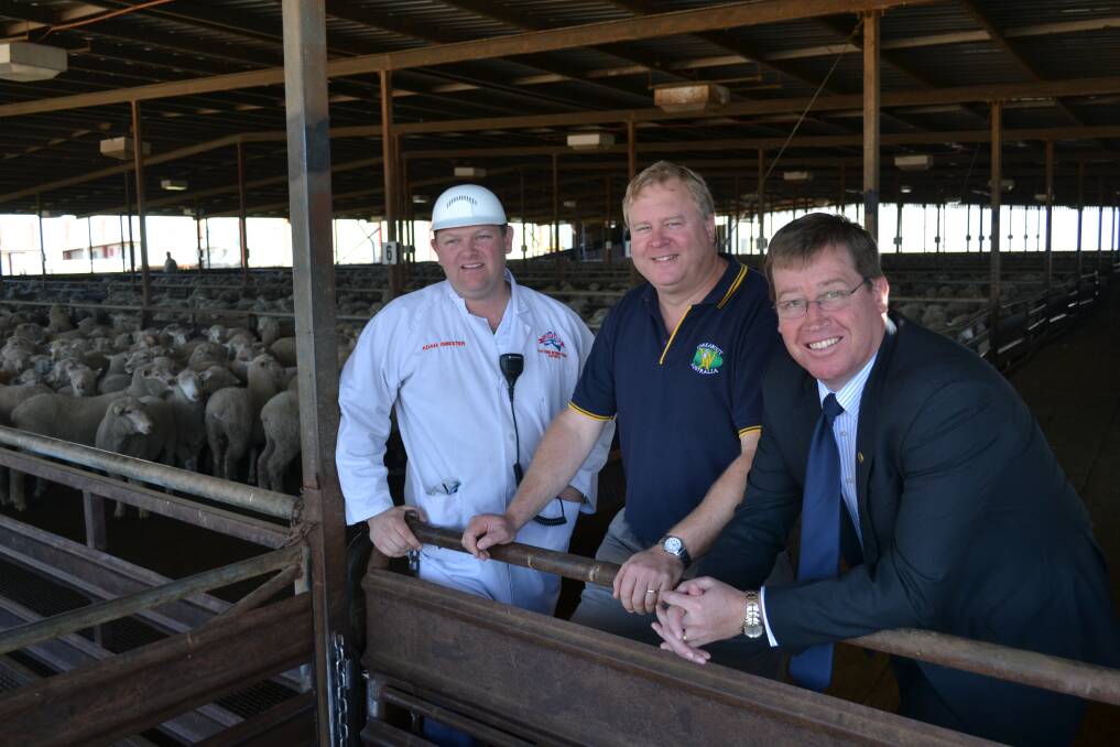Fletcher International plant manager Adam Isbester, Workabout Australia managing director Warren Williams and the Member for Dubbo Troy Grant. 	           Photo: SIMON CHAMBERLAIN
