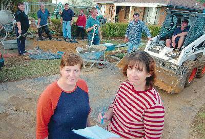 RESCUE CREW: Nicole Edmunds and Paula Miller (front) tick off another task for the 'Paula and Nic DIY Rescue' team which is working to renovate the Chandler family's home as a surprise for terminally ill Judd Chandler.Photo: BELINDA SOOLE